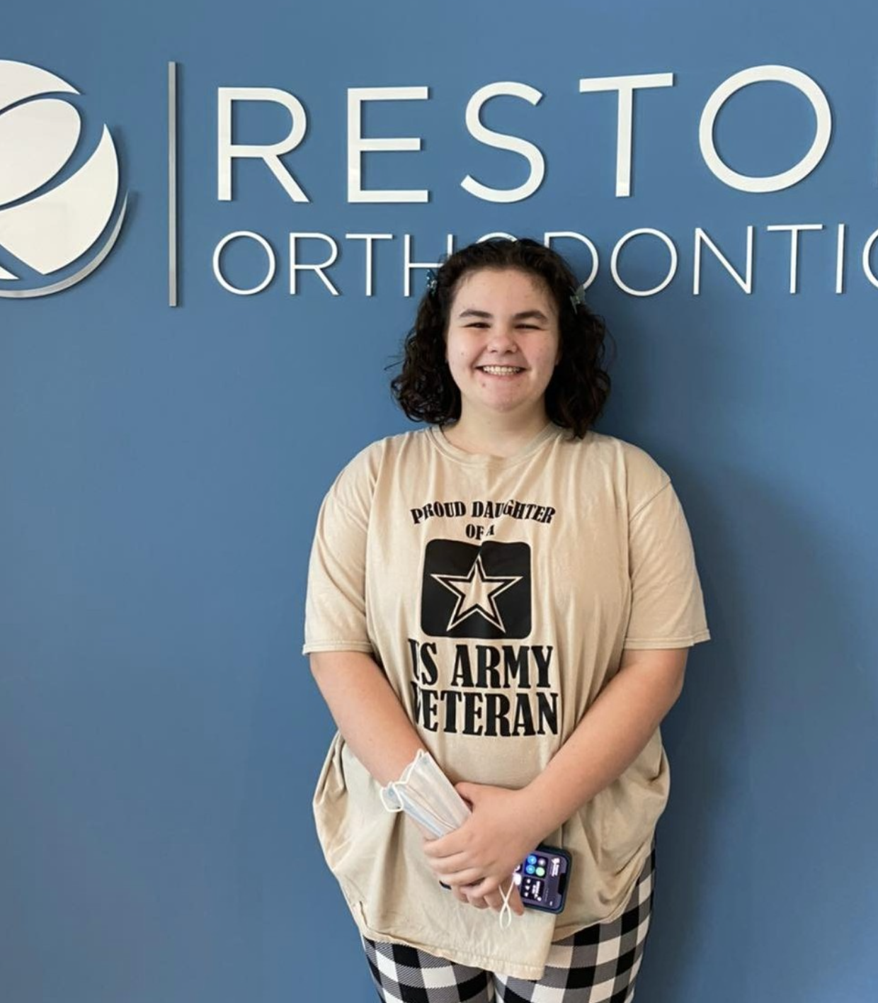 A smiling teen patient at Reston Orthodontics