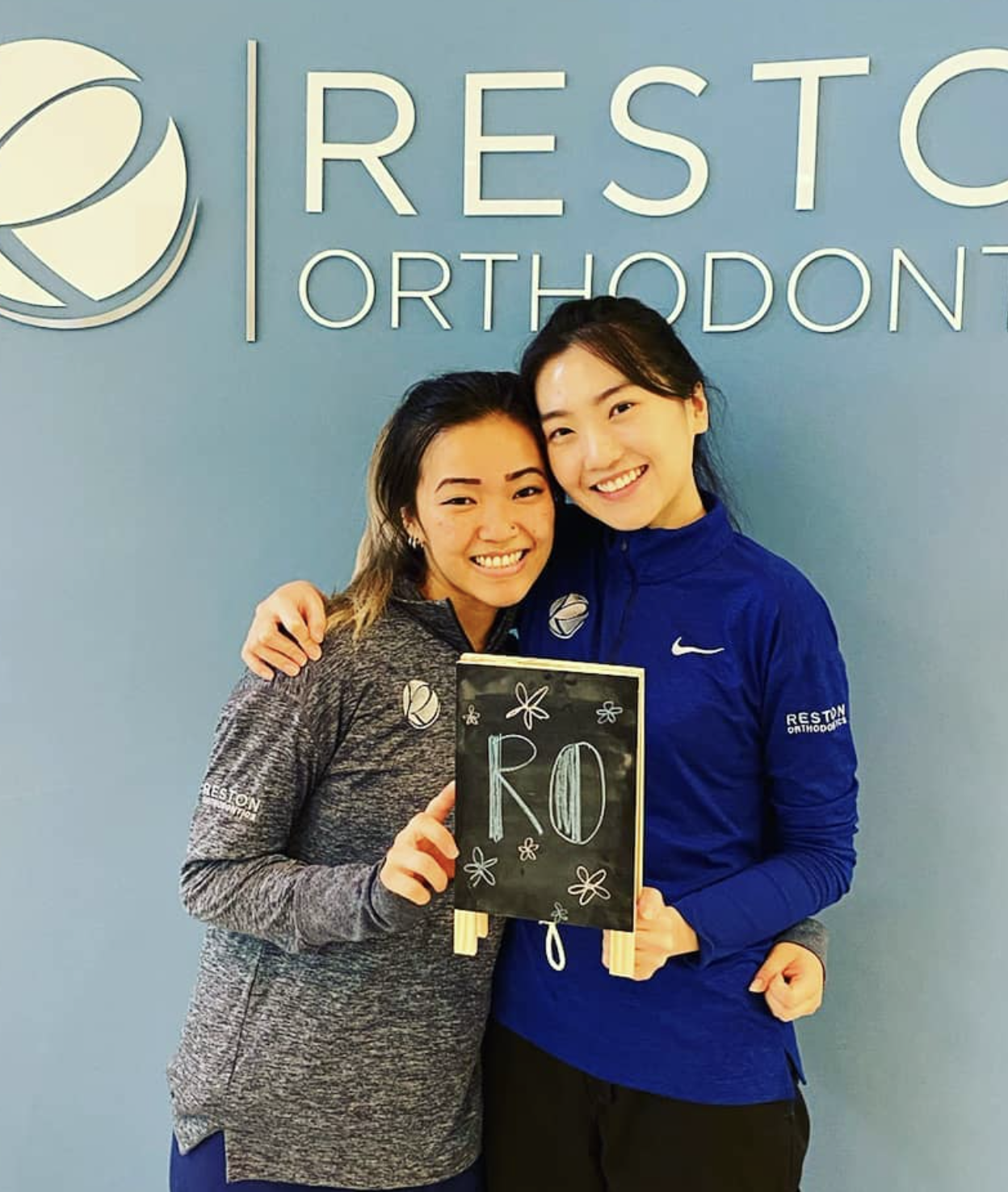 Reston Orthodontics team members celebrating together